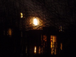 the moon over the house next door